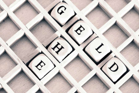 Words money and marriage from wooden letters