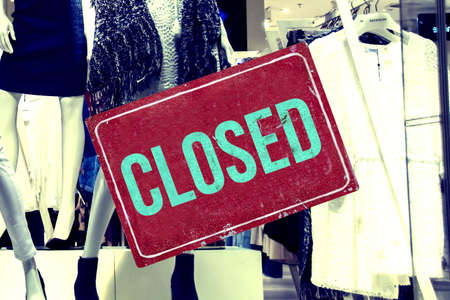 Shop window of a shop and sign closed