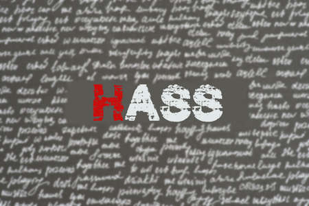 The word hate on a gray background