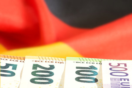 Flag of Germany and Euro banknotesの写真素材