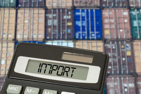 Container in the port, calculator and importの写真素材