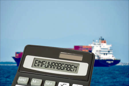 A ship with containers, calculator and import duties