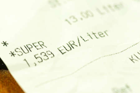 Close up of a receipt for gasoline refuelingの写真素材