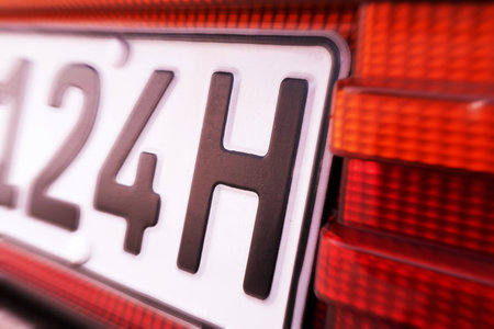 Close up of an H license plate on a vintage carの写真素材