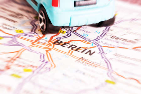 A car and a city map of Berlinの写真素材