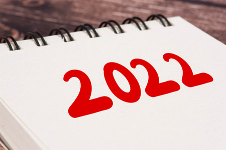 A notepad and a note on the year 2022の写真素材