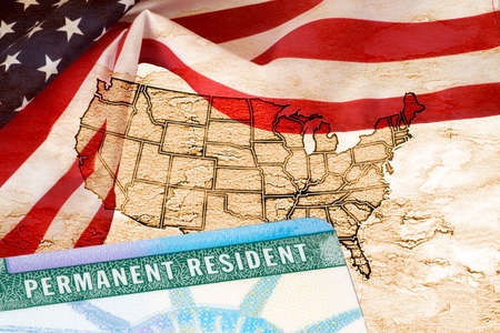 Flag of USA and the green cardの写真素材