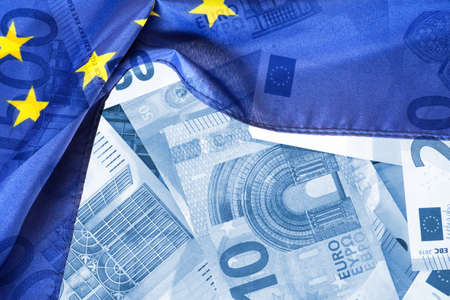 European Union flag and Euro banknotes