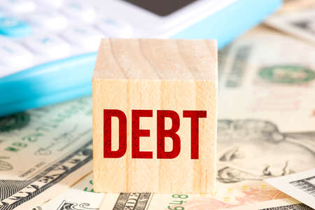 Dollar banknotes, calculator and debts in Americaの写真素材