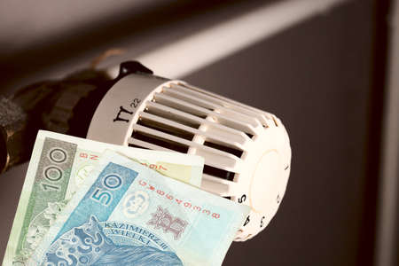 Radiators, money Polish zloty PLN and heating costsの写真素材