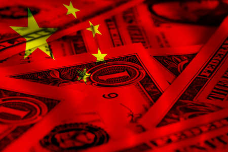 Dollar and flag of chinaの写真素材