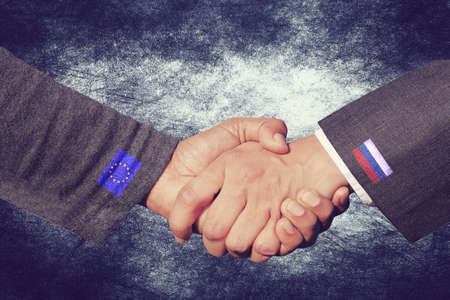 Handshake and cooperation between Russia and the European Union EUの写真素材