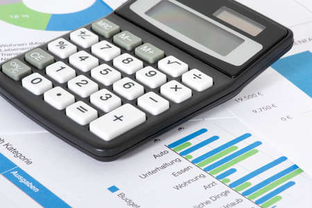 A calculator, inflation and spendingの写真素材