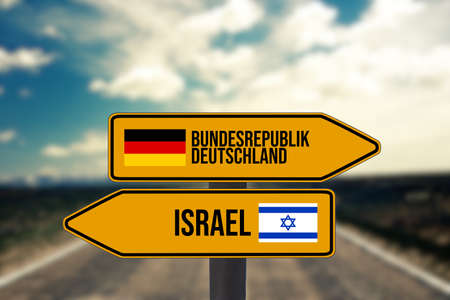 Arrows point to directions Germany and Israelの写真素材