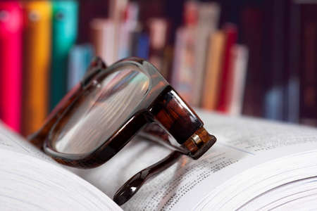 A book and glassesの写真素材