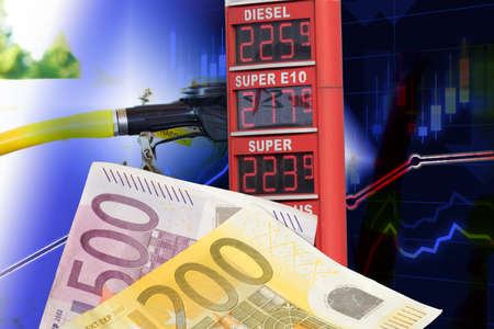 Euro banknotes, petrol pump and gas station in Germanyの写真素材