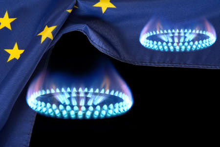 Gas flame, EU flag and gas supplies to Europeの写真素材