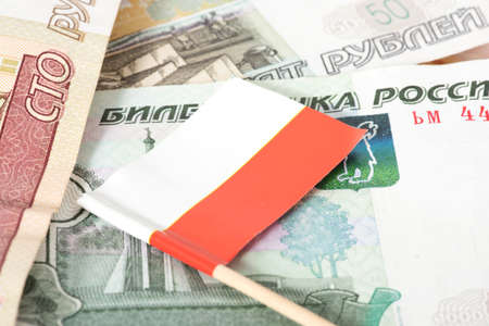 Flag of Poland and ruble banknotes