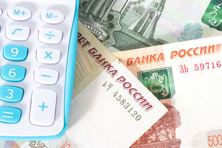 Banknotes of Russian rubles and a calculator