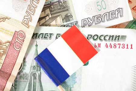 Flag of France and ruble banknotesの写真素材