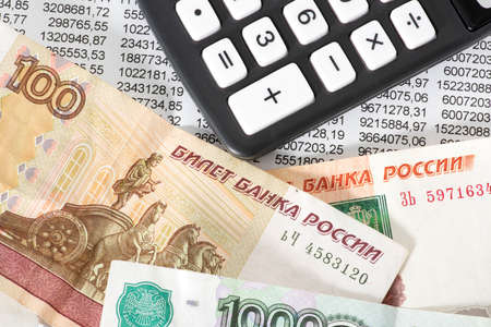 Banknotes of Russian rubles and a calculator