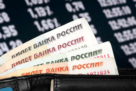 A purse, banknotes Russian rubles and the economy of Russia