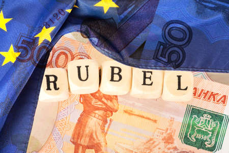 European Union EU flag and banknotes Russian rublesの写真素材