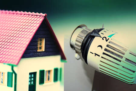 A house and regulator for the heatingの写真素材