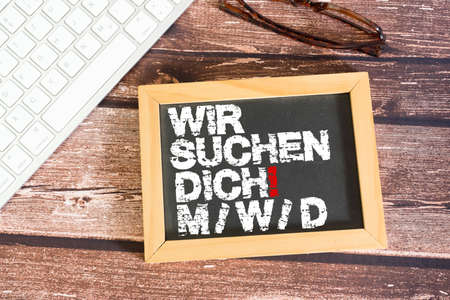 Business and finance concept. On a wooden background, there is a blackboard with the inscription - WHAT IS YOUR PLAN?の写真素材