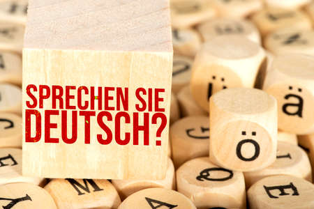 Business and finance concept. On the table are wooden cubes with the inscriptionの写真素材