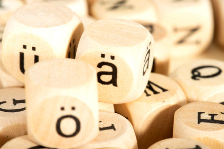 Close up of wooden dice with the letters Q, R, Oの写真素材