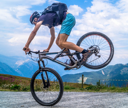 Cyclist on a mountain bike in the mountains. Extreme sport.の写真素材