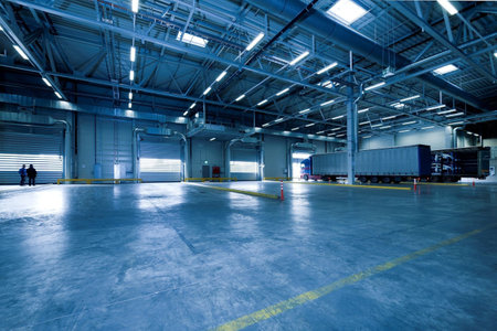 interior of a large industrial warehouse with racks and shelves for storing goodsの写真素材