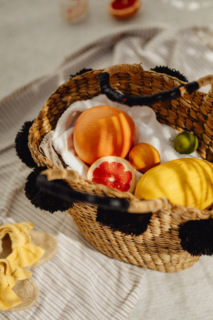wicker basket with lemons and grapefruits, top viewの写真素材