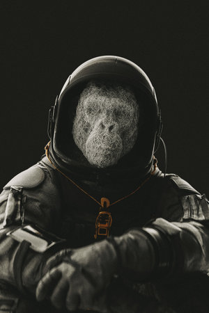 Astronaut in helmet and spacesuit on a dark background.の写真素材