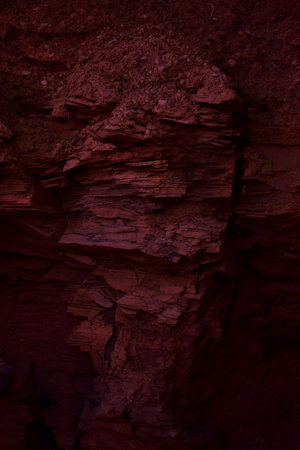 Close up of red sandstone wall. Abstract background and texture for design.