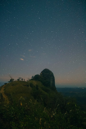 Mountain and starry sky in Phu Kradueng National Park, Loei, Thailandの写真素材