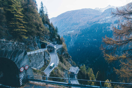 Mountain road in the Alps. View from the top of the mountain.の写真素材