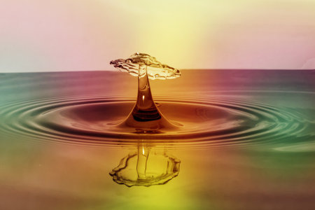 Falling drops of water. Splash effect after collision a falling drops with water Surface