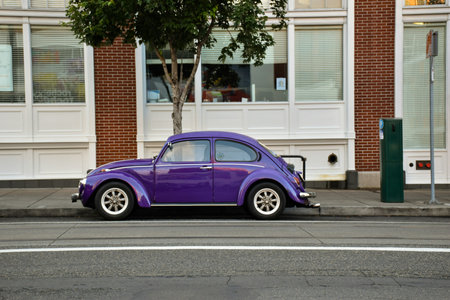Vintage purple car parked on the street in Melbourne, Australia.の写真素材
