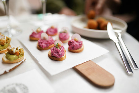 Canapes on the table. Selective focus. Food background.の写真素材