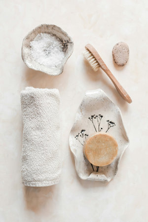Spa still life with bath accessories on white background. Top view.