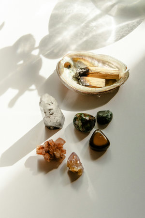 different types of semiprecious stones with shadows on white backgroundの写真素材