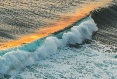 Aerial view of waves at sunset. Beautiful seascape backgroundの写真素材