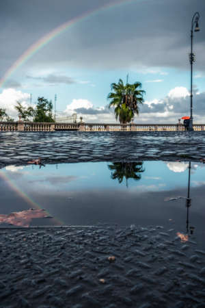 Rainbow over the city of Romeの写真素材