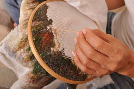 process of cross stitch close-up top viewの写真素材