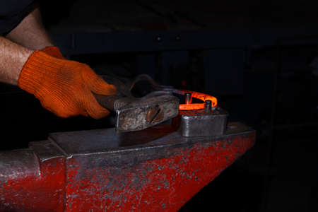 The process of manufacturing of horseshoes for horses in forge