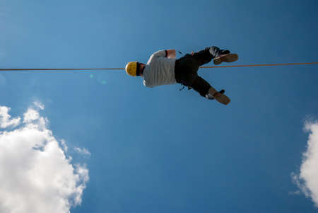 firefighter climbing with rope