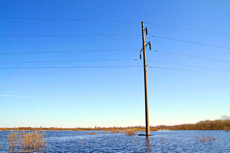 electric pole in waterの写真素材