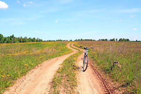 bicycle on rural roadの写真素材